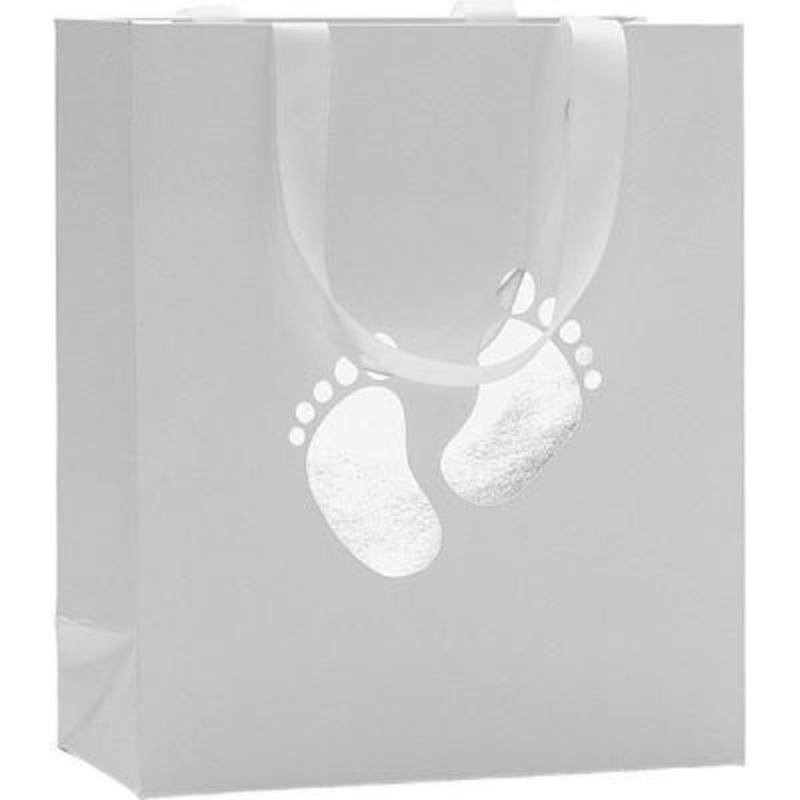 Baby Gift Bag Silver Feet - Lio by Stewo A simple but stunning design of tiny baby footprints in silver foil embossed onto pearl white paper with matching ribbon handle. Made by Swiss designer Stewo this bag has all the quality and detailing you would associate with this brand. Size 18x21x8cm